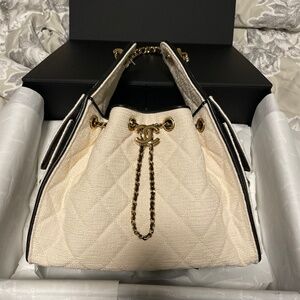 RARE Chanel 25 small canvas/black leather trim